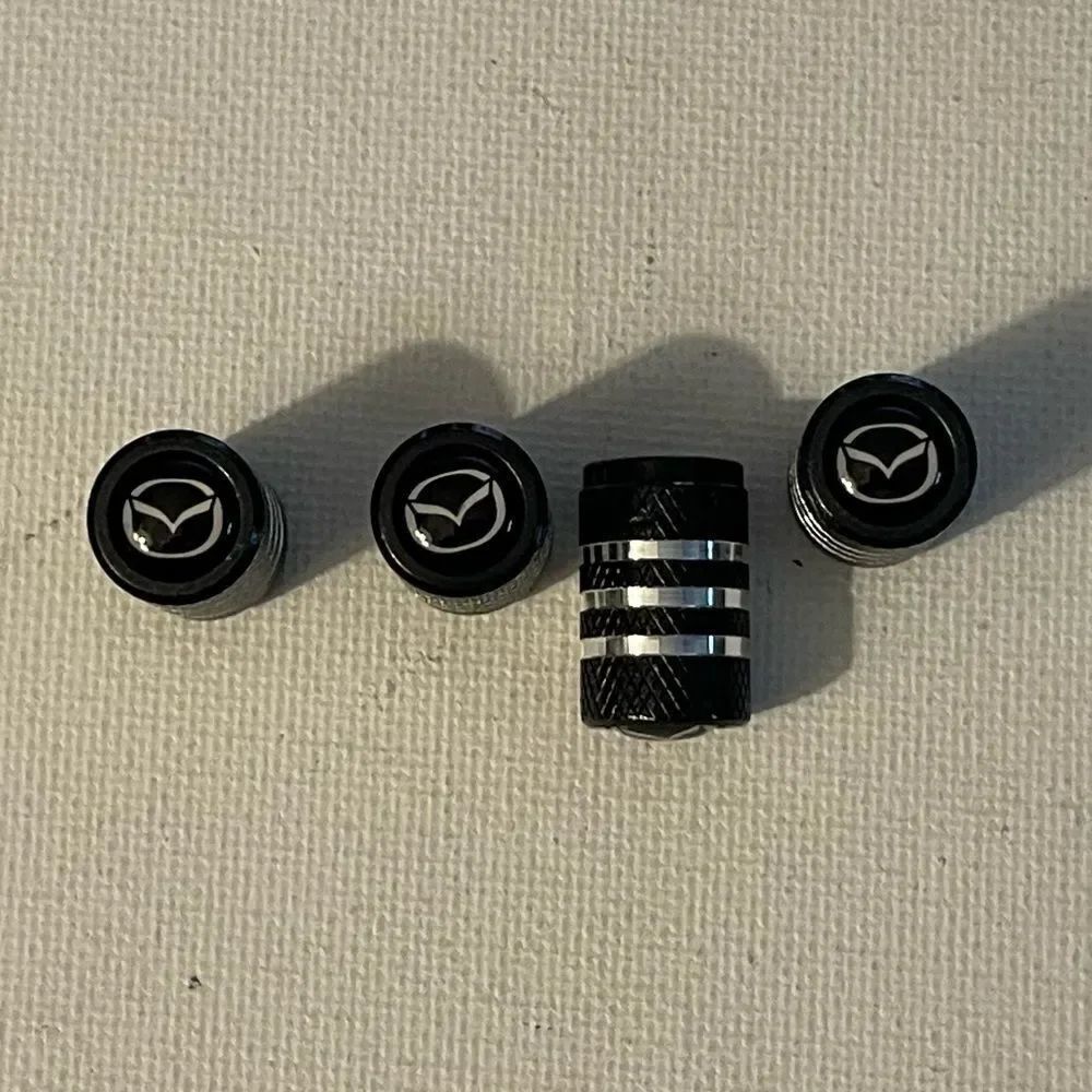 Mazda valve Stem caps in Black set of 4 NWT